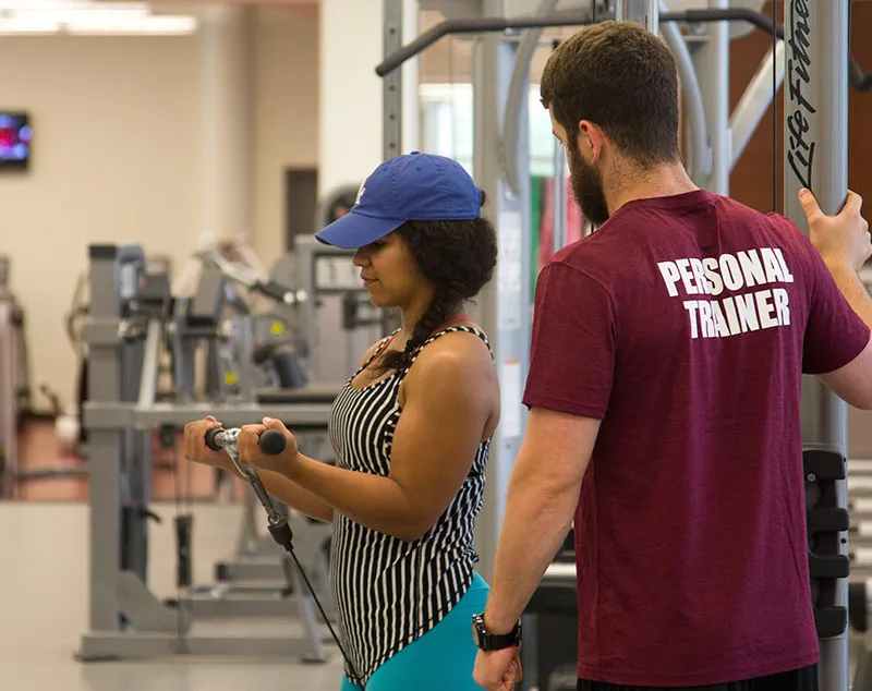 personal trainer with students