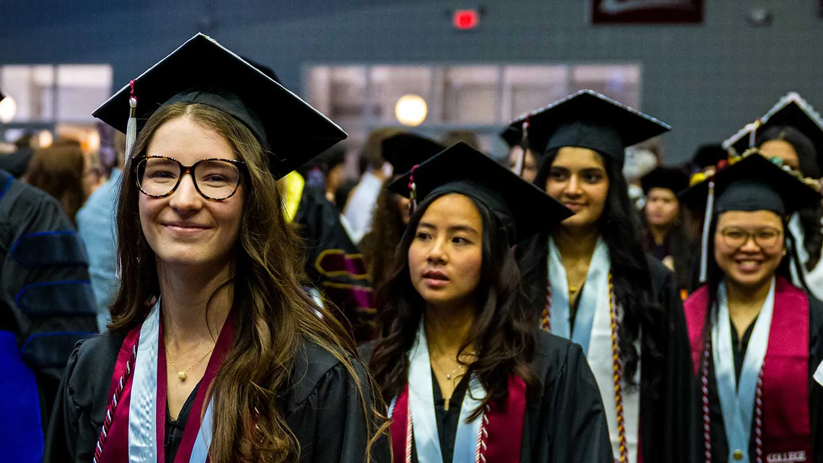Graduates walk in file during the Commencement ceremonies