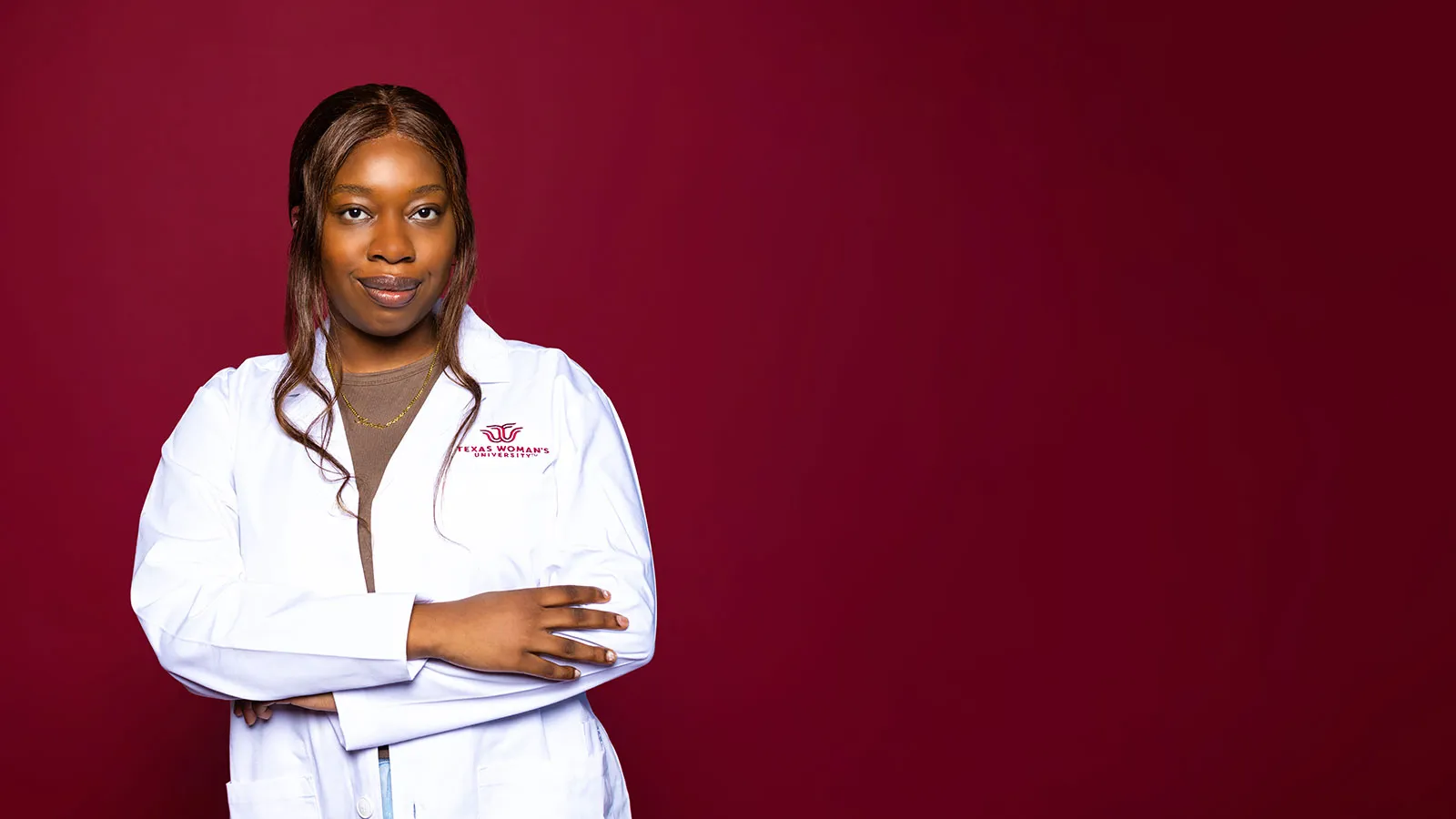 A TWU Student in a White Lab Coat