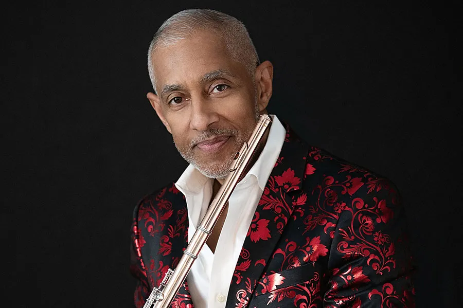 Nestor Torres poses with his flute.