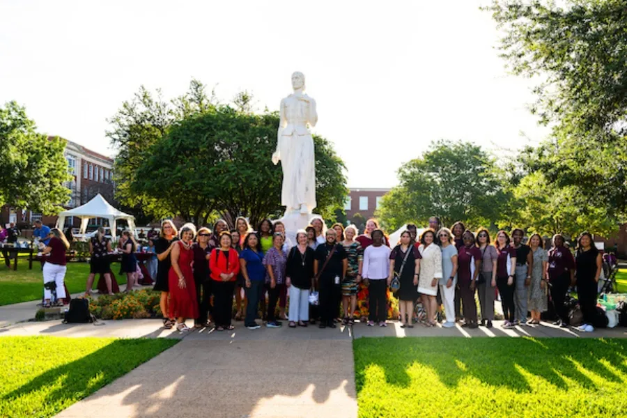 A keyhole graphic inset with a photo of Texas Woman's University Denton campus and text that reads 'Open' 