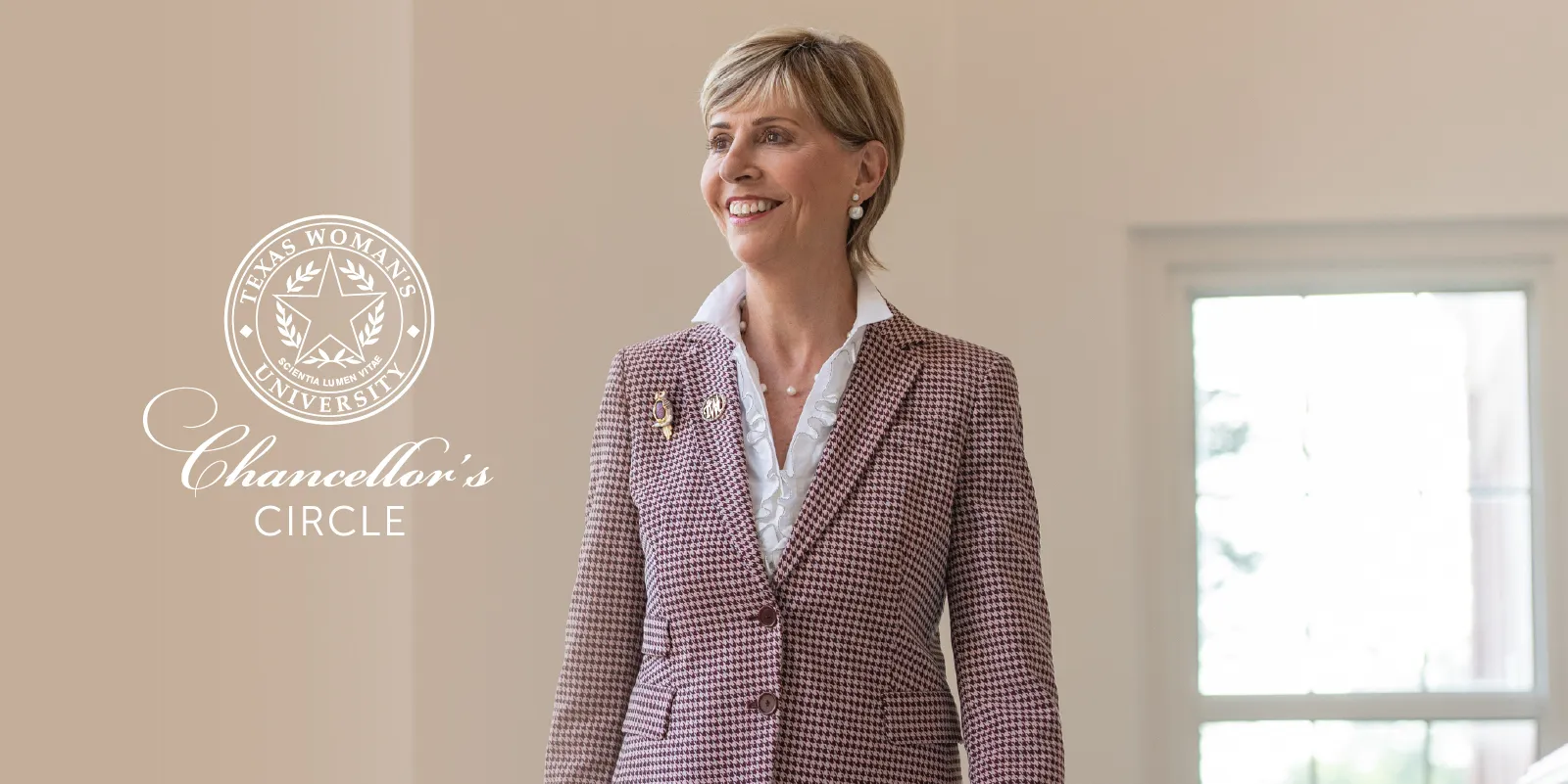 A photo of Chancellor Feyten with the Chancellor's Circle logo in white to the left of the image.