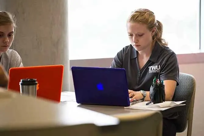 Two TWU Student on Notebook Computers