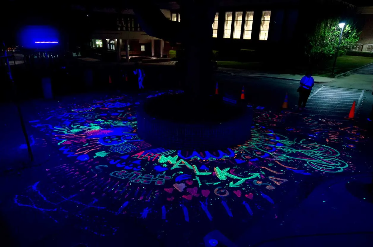 Black-light paint around the fountain at TWU