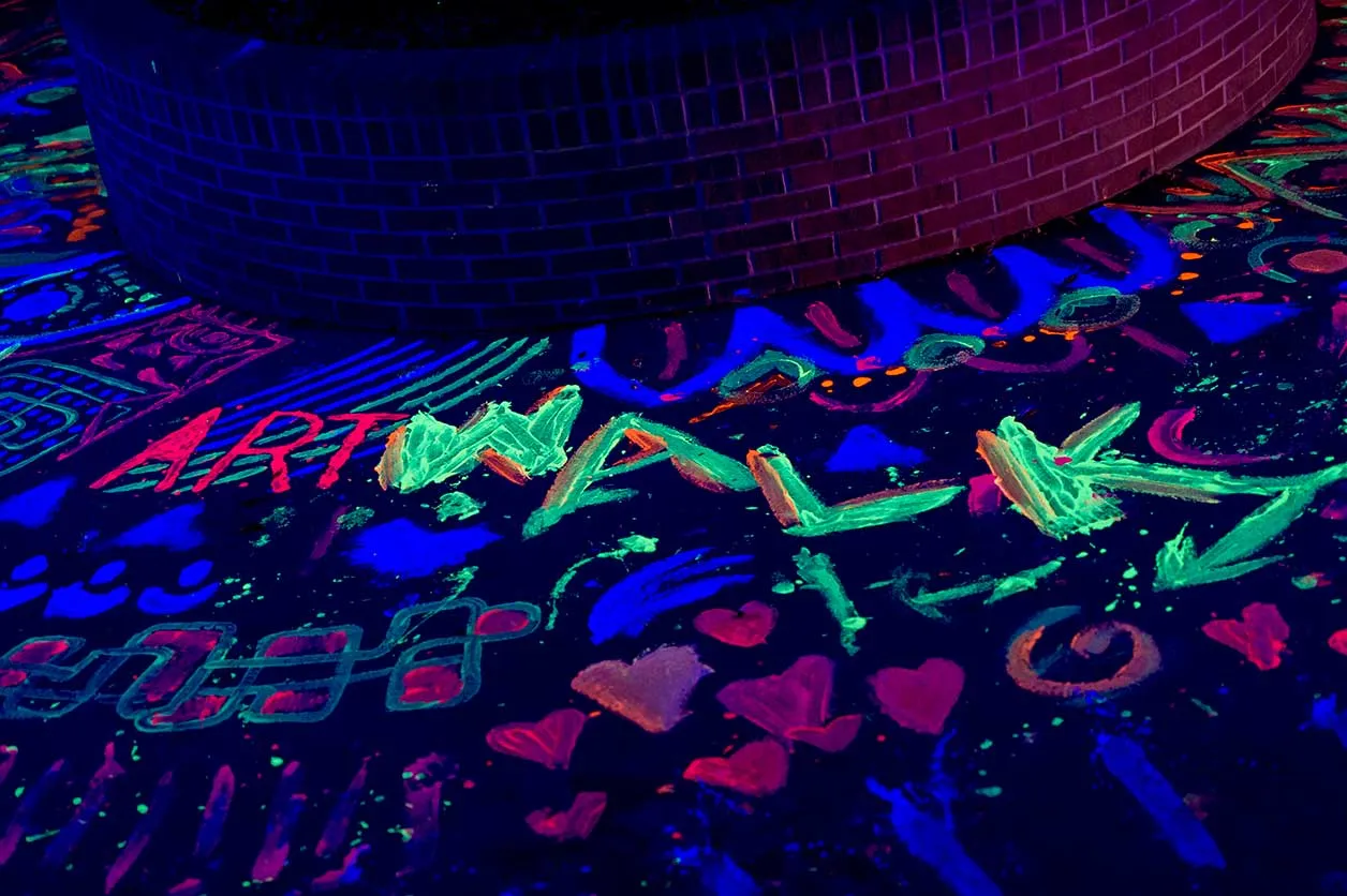 a closer view of the black light paint around the fountain at TWU