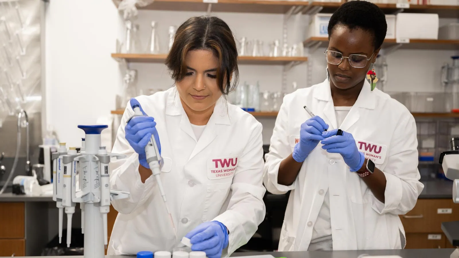 Two students in the lab