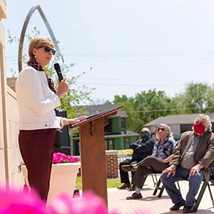 Chancellor Carine Feyten speaks at the unveiling of the 'Infinite' sculpture at the Scientific Research Commons