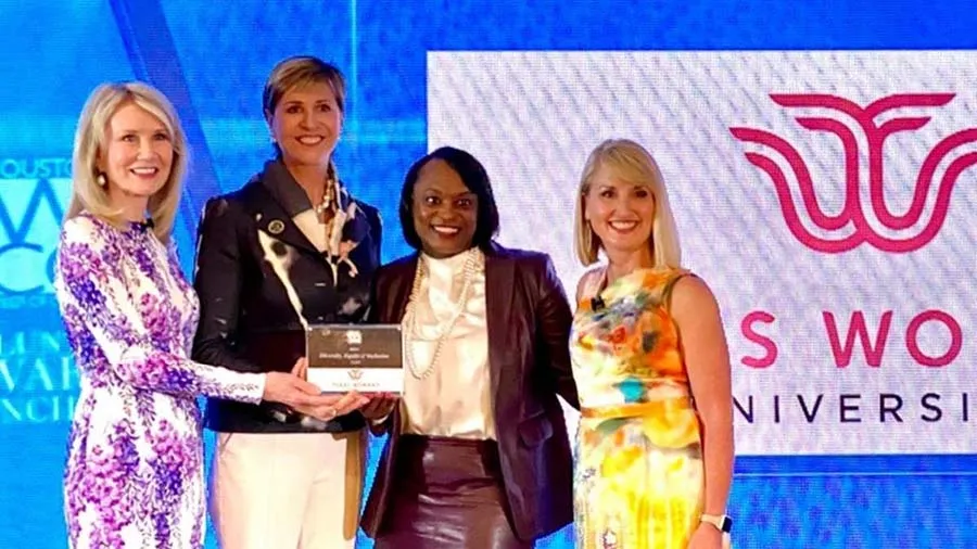 Dewaynna Horn and Chancellor Feyten accept the Greater Houston Women's Chamber of Commerce's 2021 Diversity, Equity & Inclusion Award