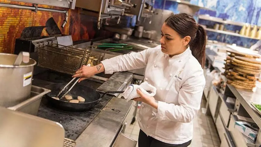 TWU alumna Michelle Tribble on the set of Hell's Kitchen