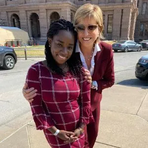 Dawna-Diamond Tyson and Carine Feyten in front of the Texas State Capitol