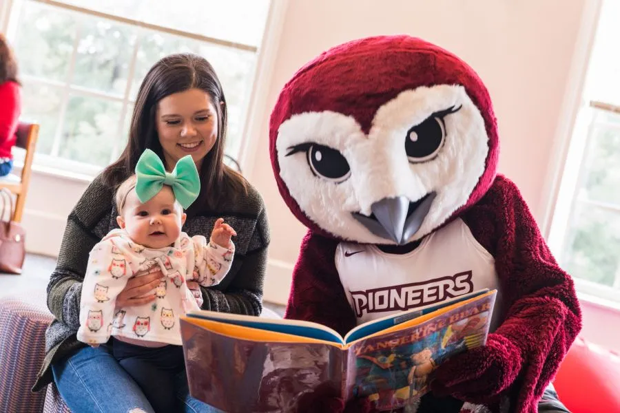 mom, baby and mascot 