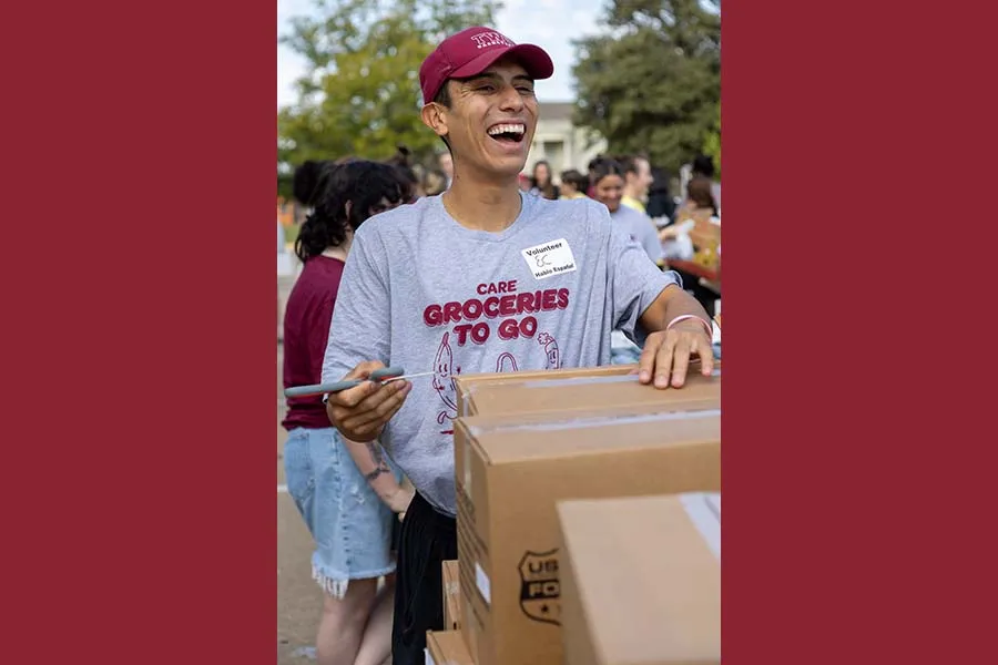 Athletics student helping out at Groceries to Go