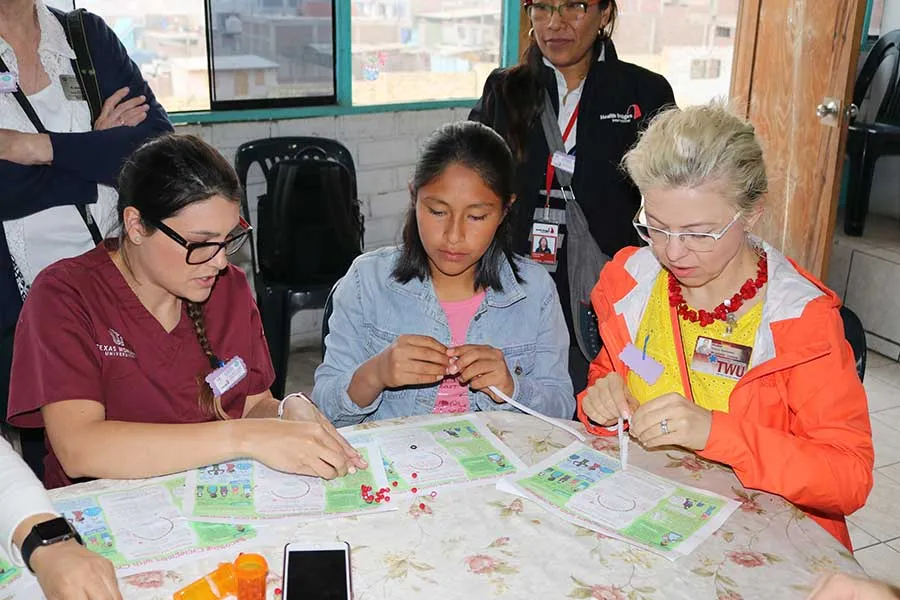 TWU nursing students teach Peruvian girls about feminine hygiene