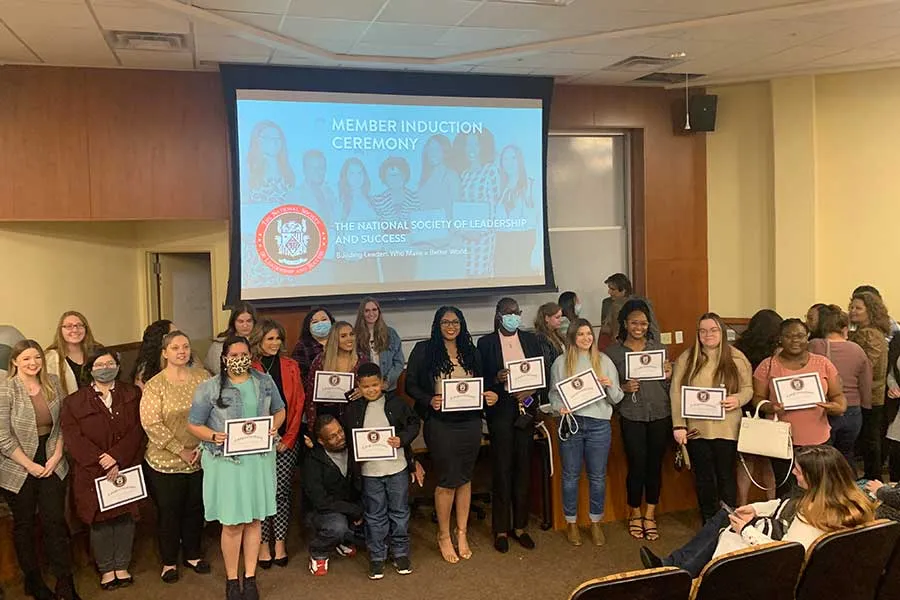 TWU students are inducted into the NSLS.