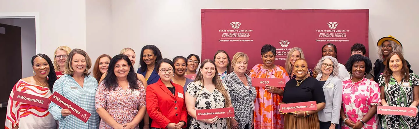A group photo of women business owners with staff members from the TWU Center for Women Entrepreneurs