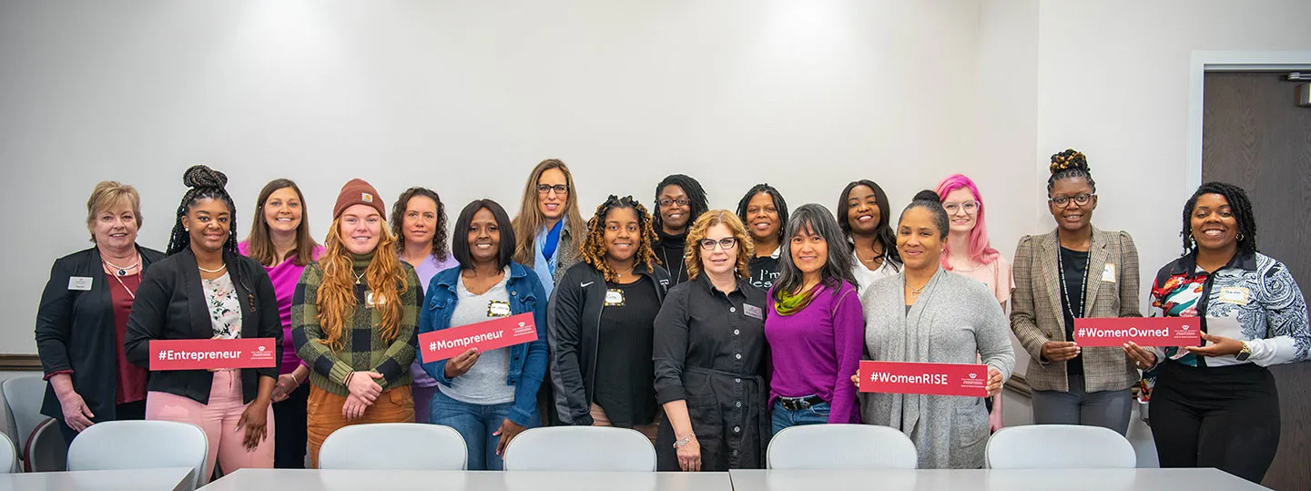 A group photo of women business owners with staff members of the TWU Center for Women Entrepreneurs