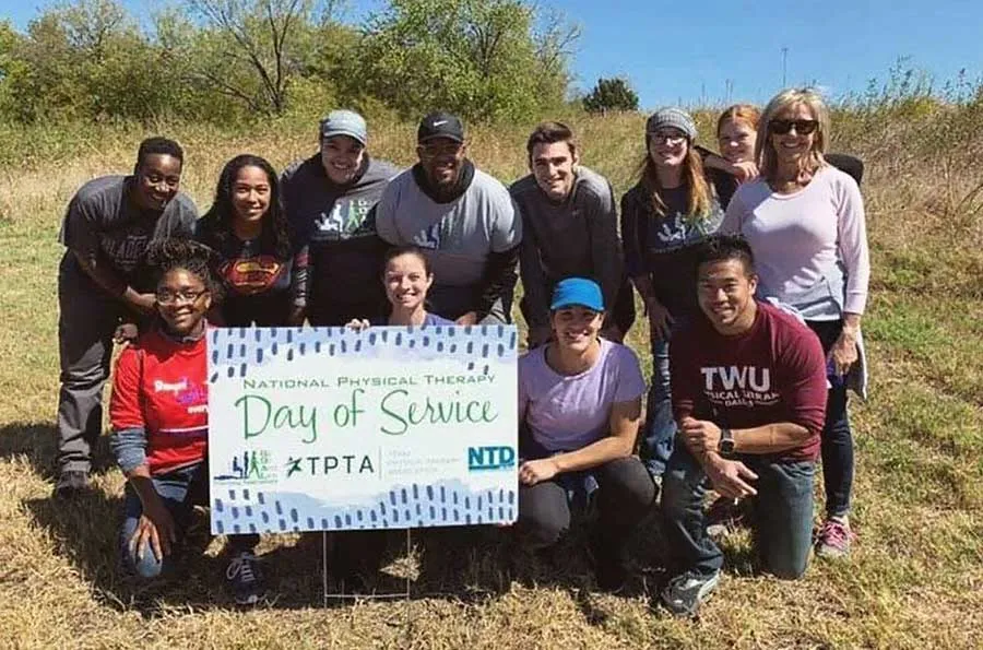 TWU physical therapy students gather for a group photo at Cedar Hill State Park in Dallas