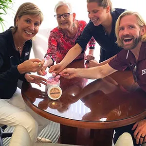 Chancellor Carine M. Feyten and her staff eating the new TWU-inspired ice cream flavor