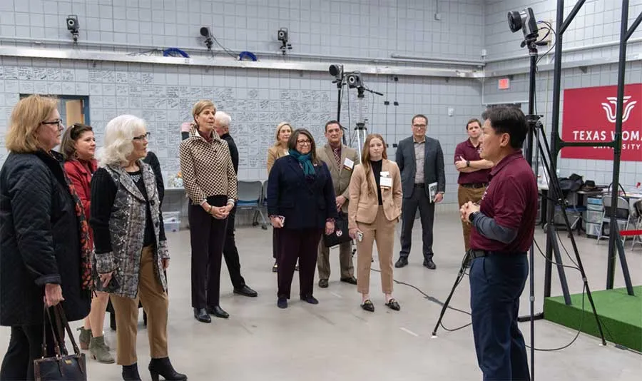Dr. Young-Hoo Kwon gives the TWU Board of Regents a tour of his biomechanics lab facilities on campus