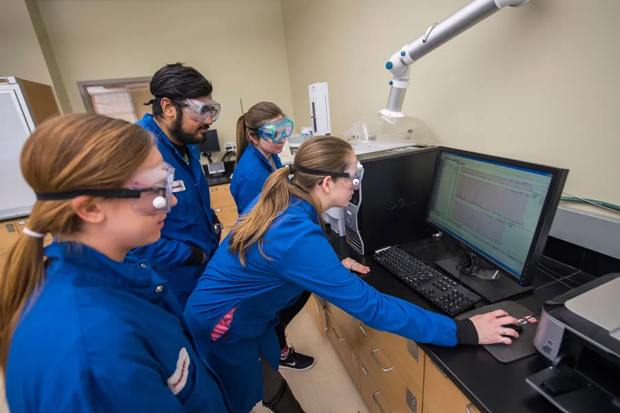 Instrumental analysis and environmental chemistry students analyze fracking water samples