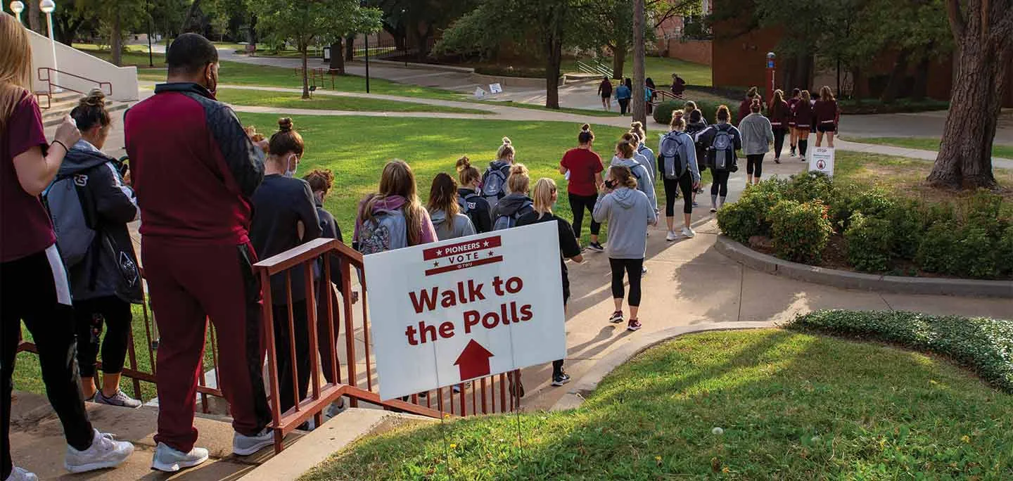 A group of TWU faculty, staff, and students participating in the Walk to the Polls campus event