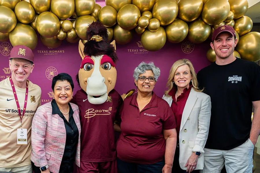 Executive Dean Yelkur and associate dean Pushkala Raman stands with Trinity FC leadership