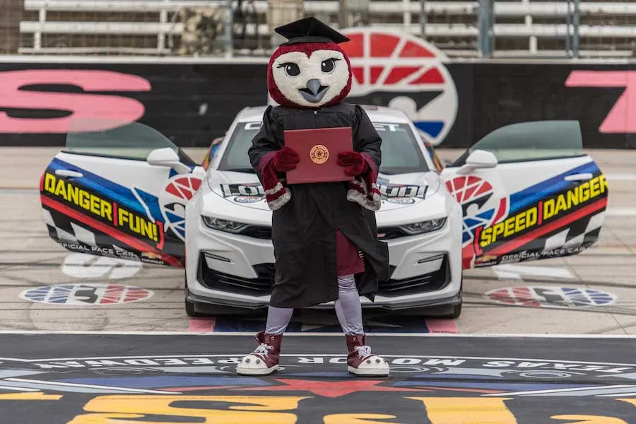 TWU's Oakley mascot stands at the finish line at Texas Motor Speedway for graduation