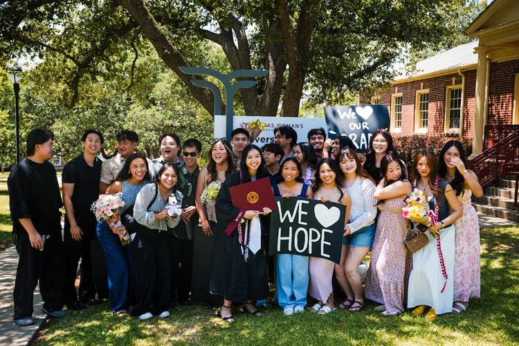A group of students posing for photo