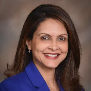 Smiling woman with long brown hair