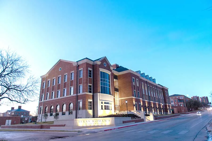 TWU's Scientific Research Commons on the Denton campus at dusk.