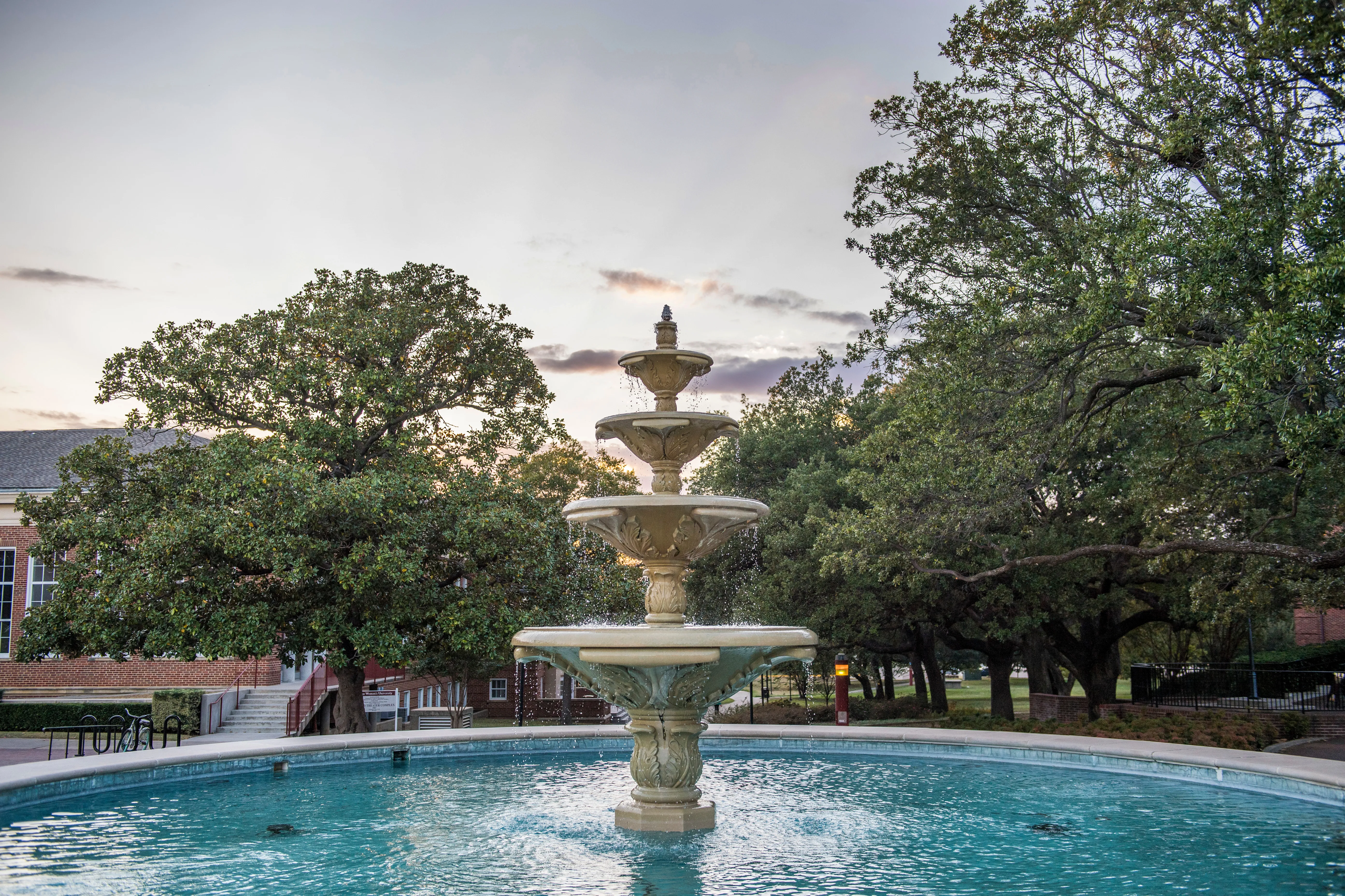 Fountain with trees in background