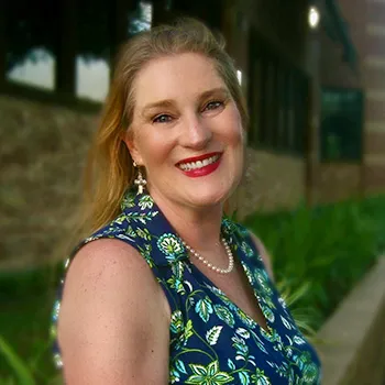 A headshot photo of Faith Tissot