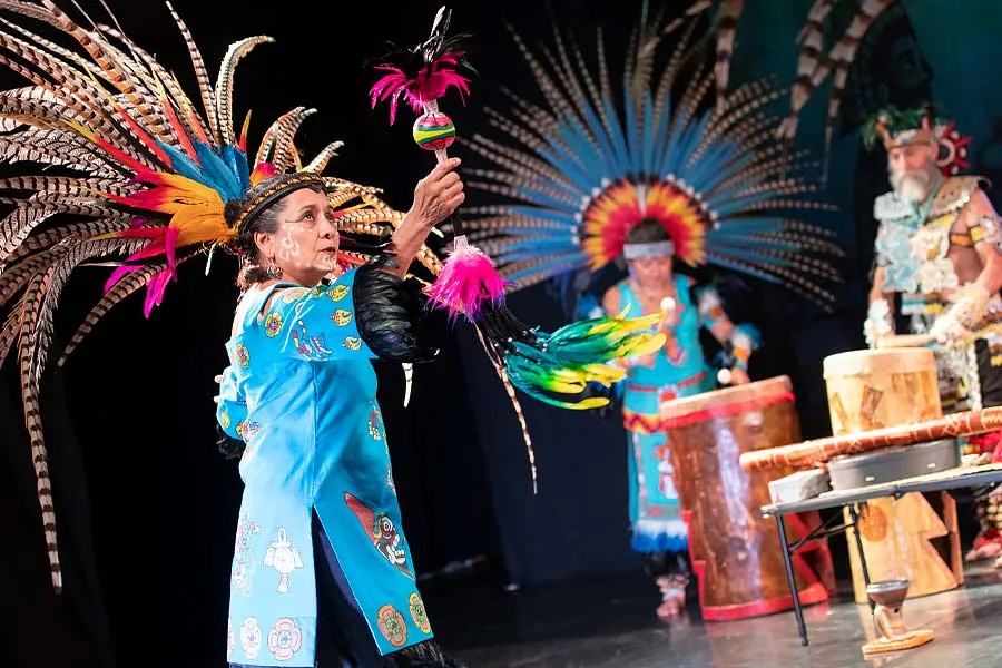 A dancer moves to the drumbeat