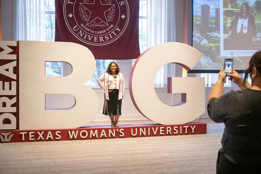 Student standing in BIG