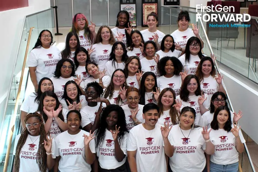TWU First Generation students pose on the stairs in SUHH