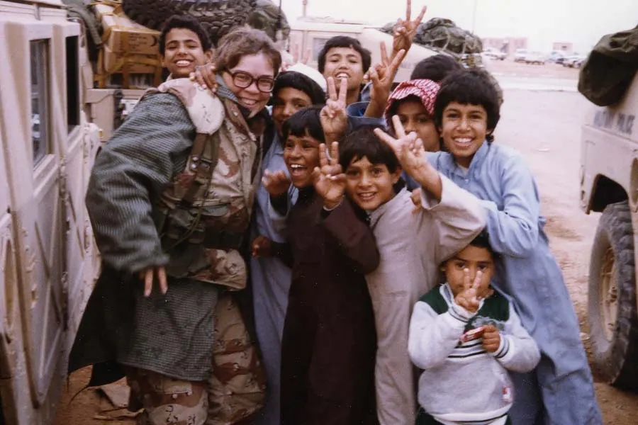 Jeanann Madden with a group of children in Saudi Arabia