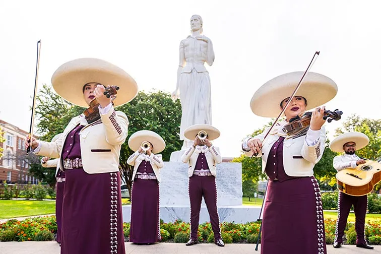 The TWU Mariachi band performs outside on Pioneer Circle