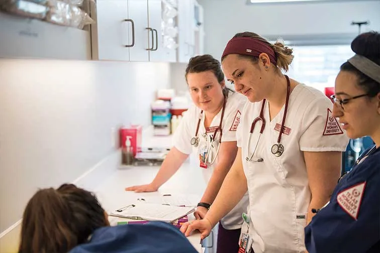 TWU College of Nursing students studying in a clinical setting