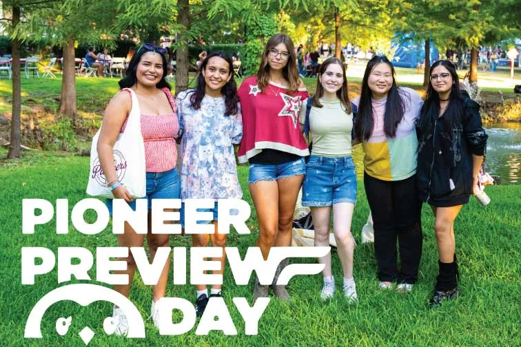 A group of TWU students relax on the lawn outside of Hubbard Hall with a graphic on the image that says "Pioneer Preview Day".