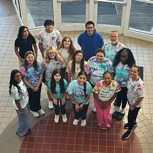 UNIV 1233 students wearing their tye-dye shirts