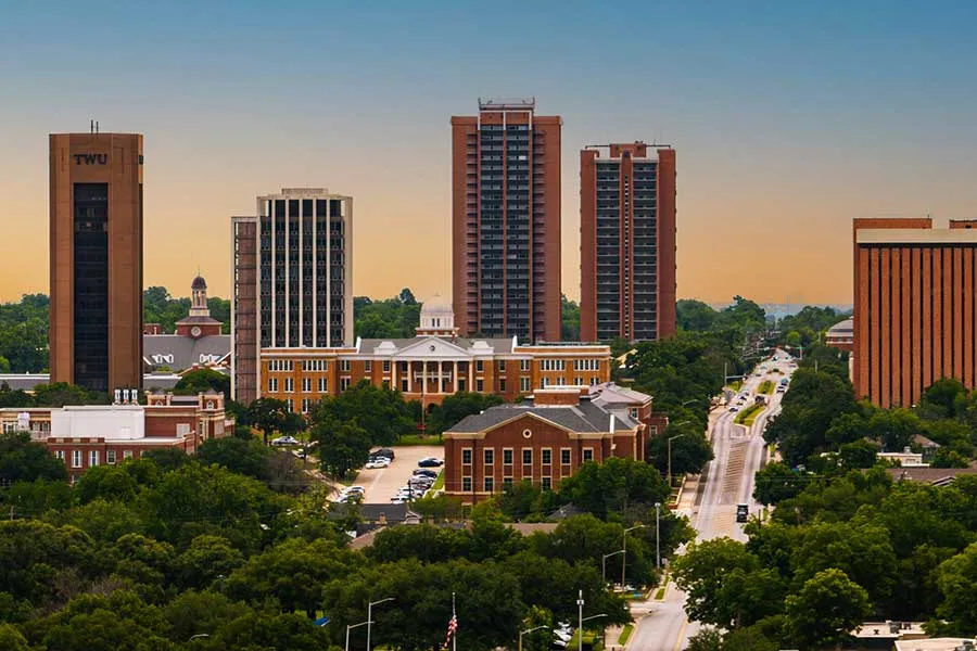 An aerial shot of the TWU Denton campus during sunset.