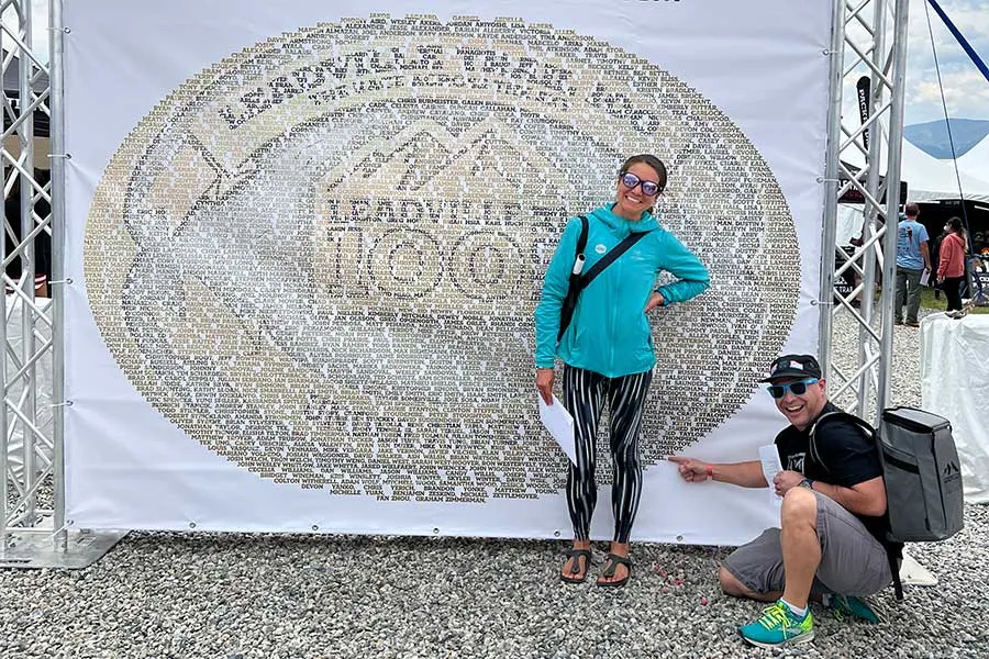 Roxanne Vogel stands in front of sign for Leadville Trail 100 run