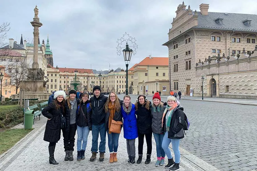 Group of honors students with Assistant Director Beth Whitley at Prague Castle, January 2020.