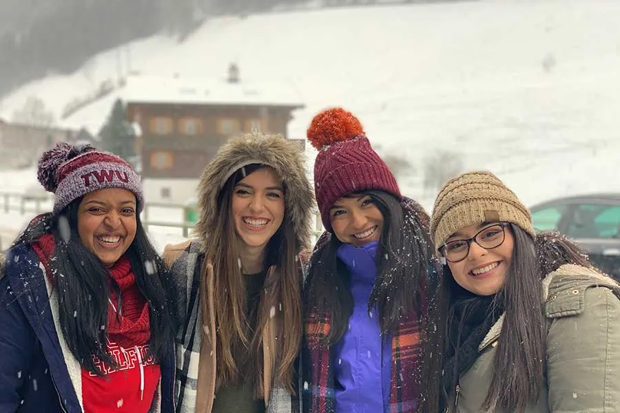 Honors students Chelsy Mani, Veronica Aguilera, Estefany Aguilera, and Hannah Castro enjoying their first snow in Switzerland, 2019.
