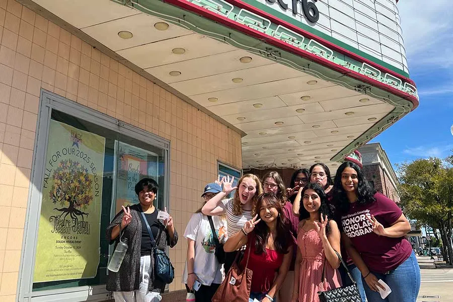 TWU Honors students outside the theater where Grease is playing