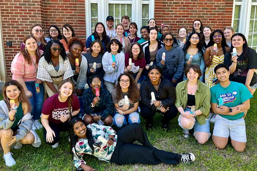 A group of Honors students enjoying popsicles at a retreat