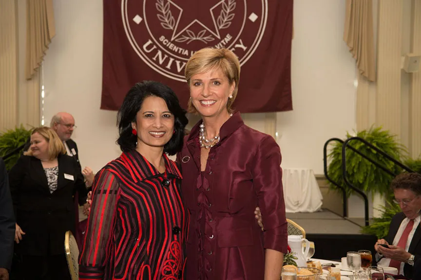 Chancellor Feyten and Dr. Khator pose together for a photo