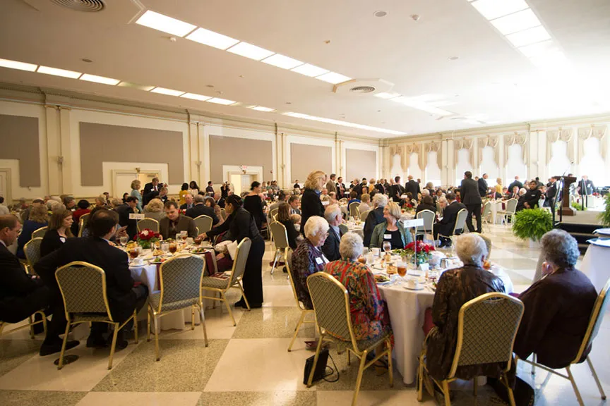 a photo of the luncheon hall with people seated