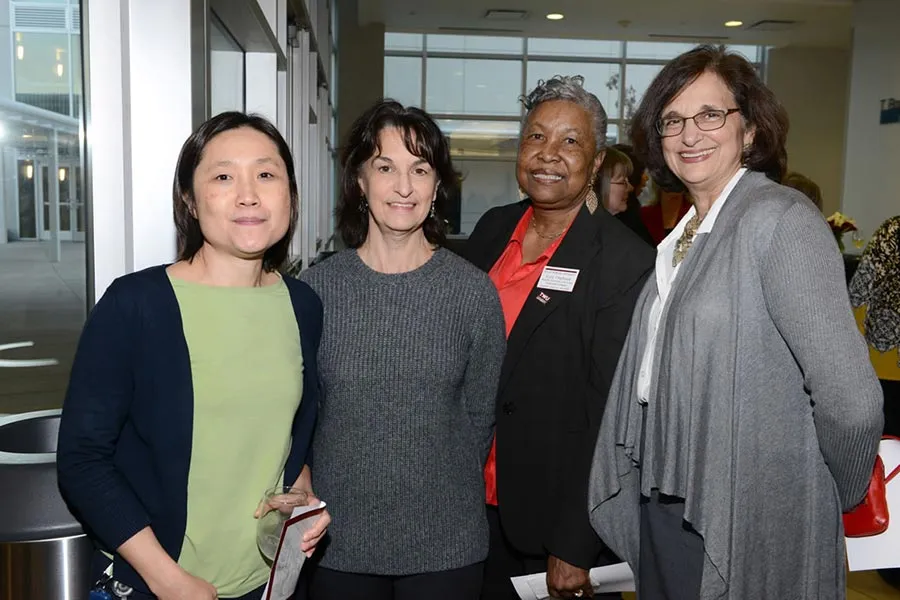 A group of four women, including Dr. Elaine Jackson and Regina Campbell