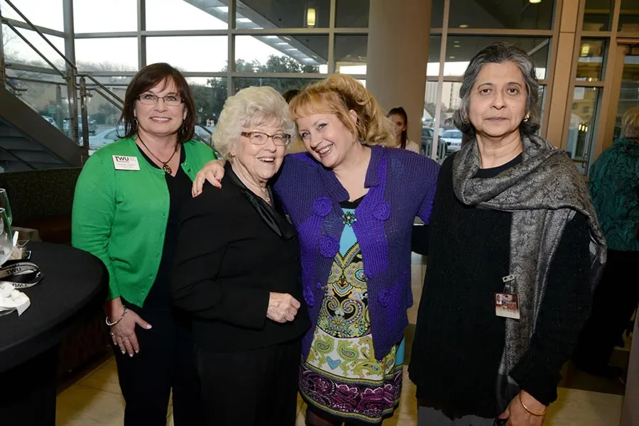 A group of four women, including Stephanie Stevens, Karen Long-Trail, and Kam Mukherjee